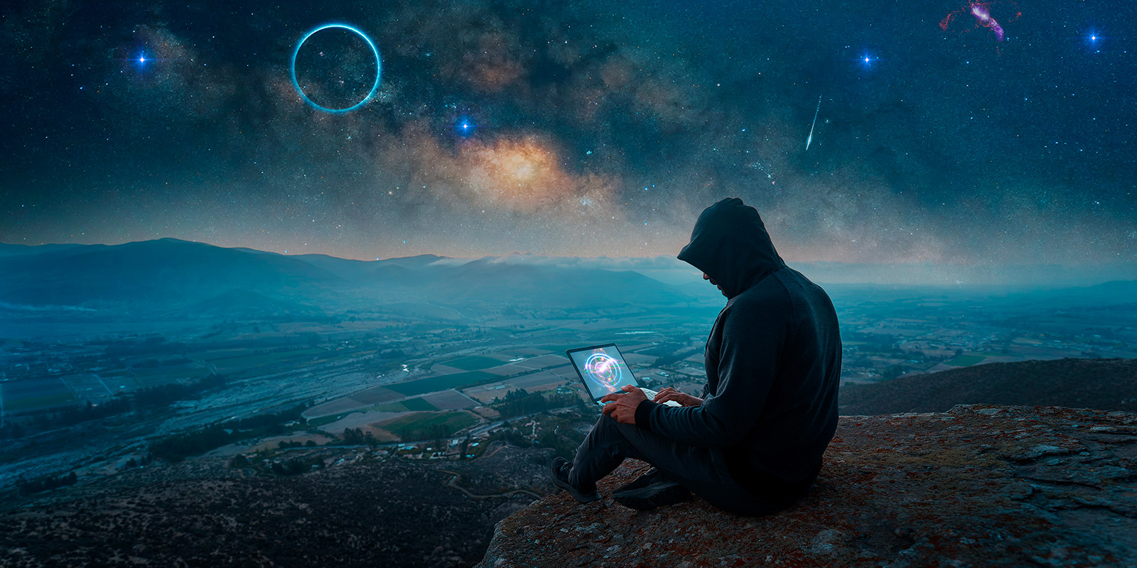 person silhouette with laptop top mountain starry night